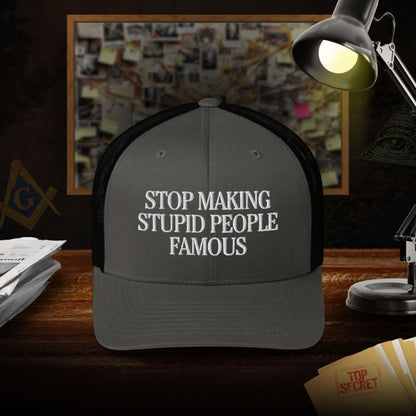 Stop Making Stupid People Famous Trucker Cap