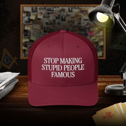 Stop Making Stupid People Famous Trucker Cap