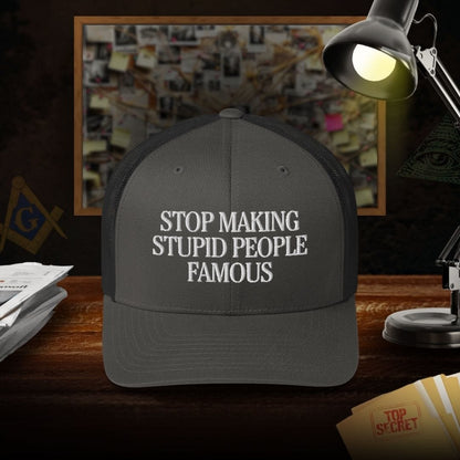 Stop Making Stupid People Famous Trucker Cap